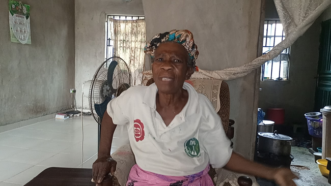 An elderly resident of Ajobo Community