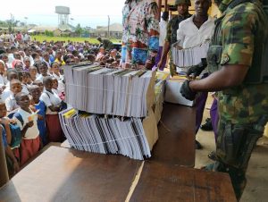 Exercise books presented to students of Community Secondary School, Ebubu, by the 29 battalion, 6 DIV, Nigerian Army